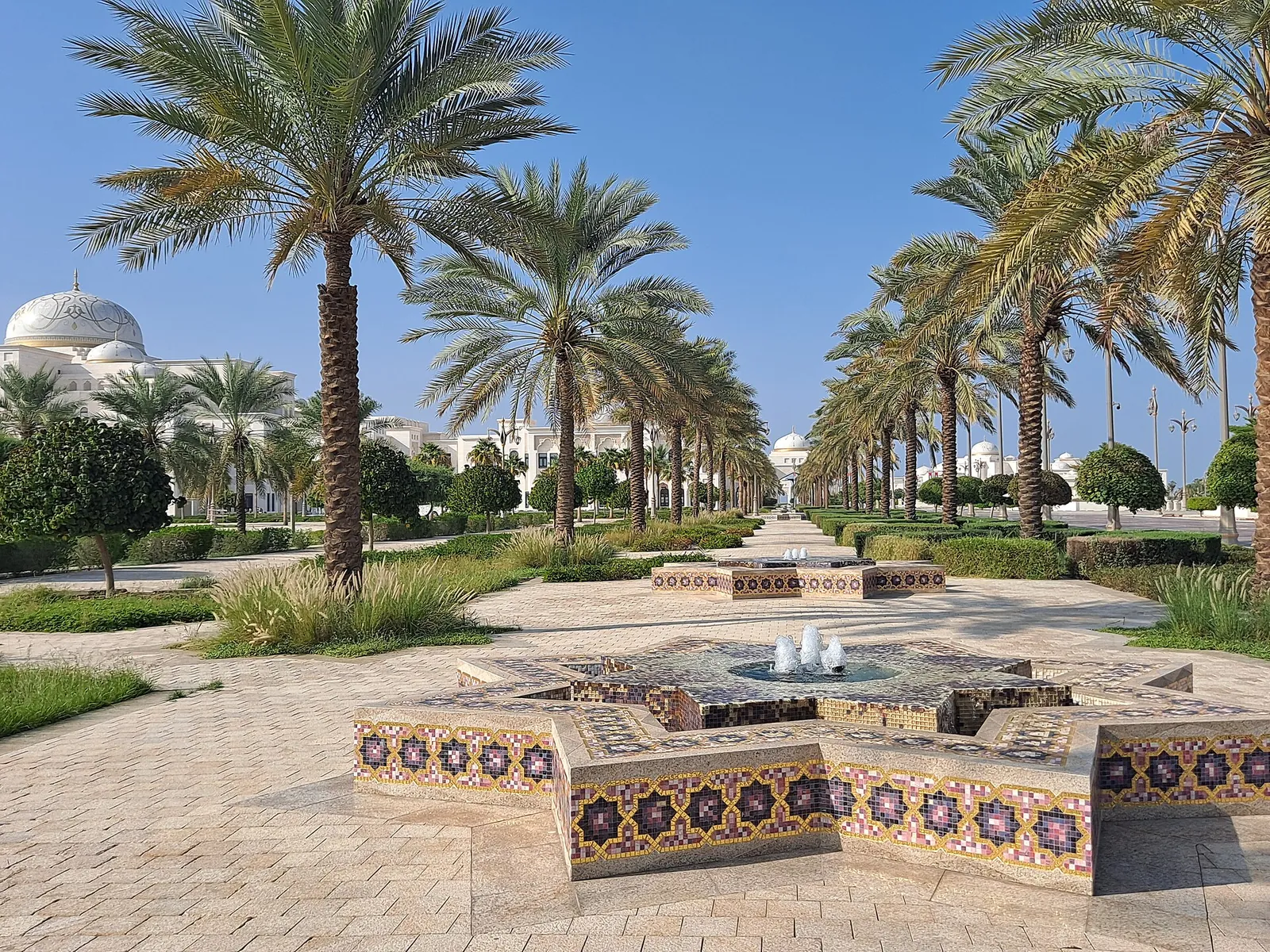 Palm gardens and fountain in the Qasr Al Watan grounds