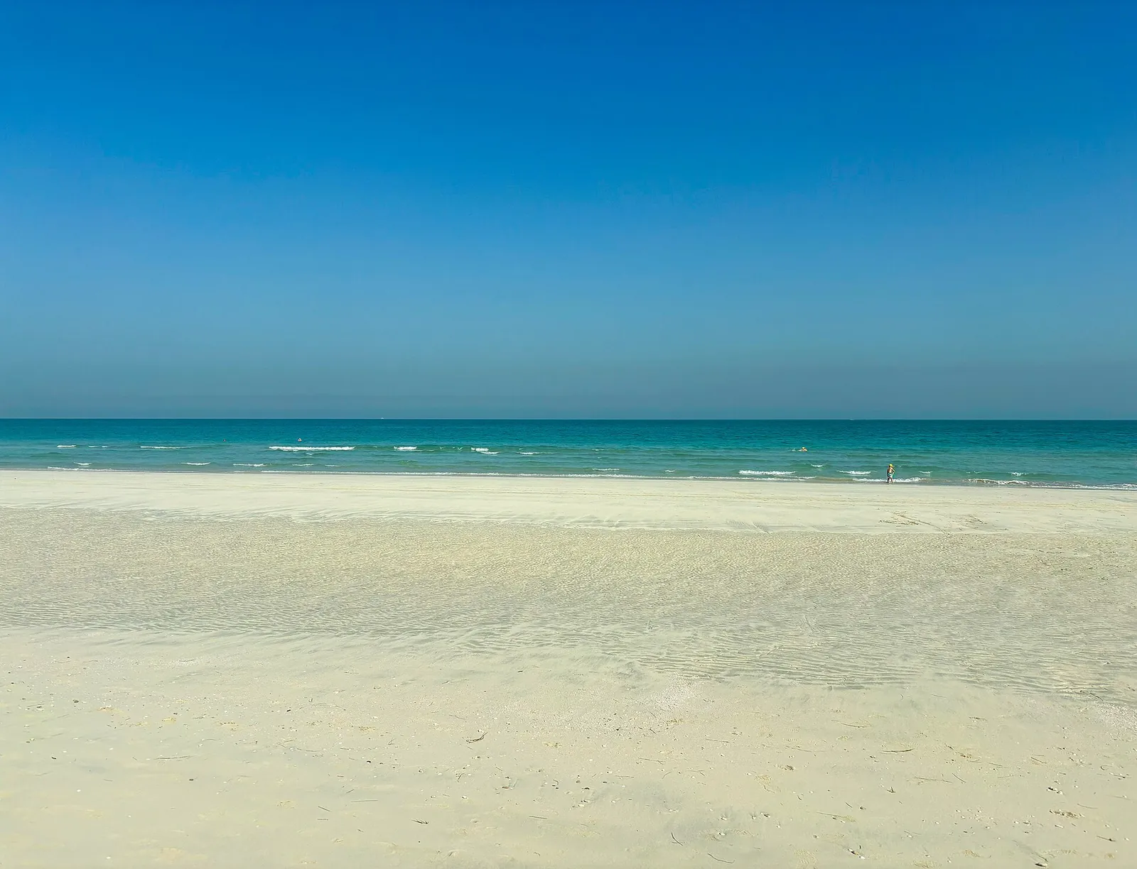 White sand and calm turquoise sea on Saadiyat Island