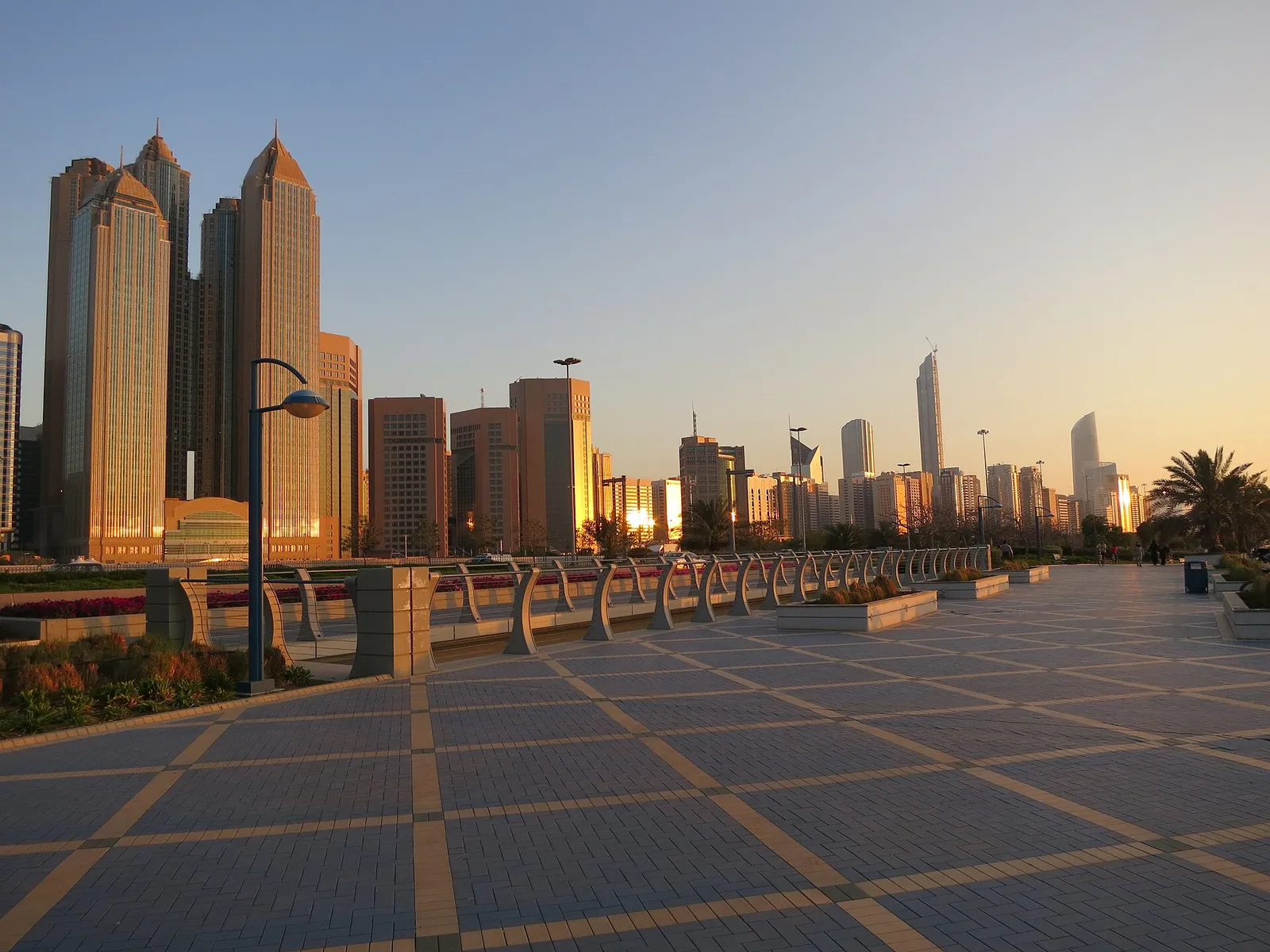 Golden evening light on the Corniche promenade
