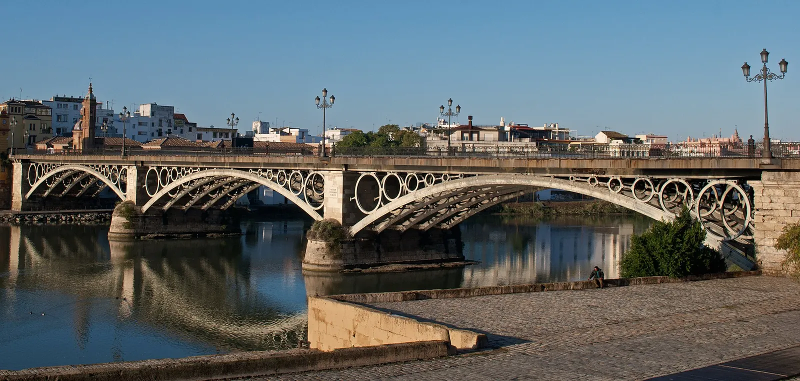 Triana Bridge over the Guadalquivir on a sunny day