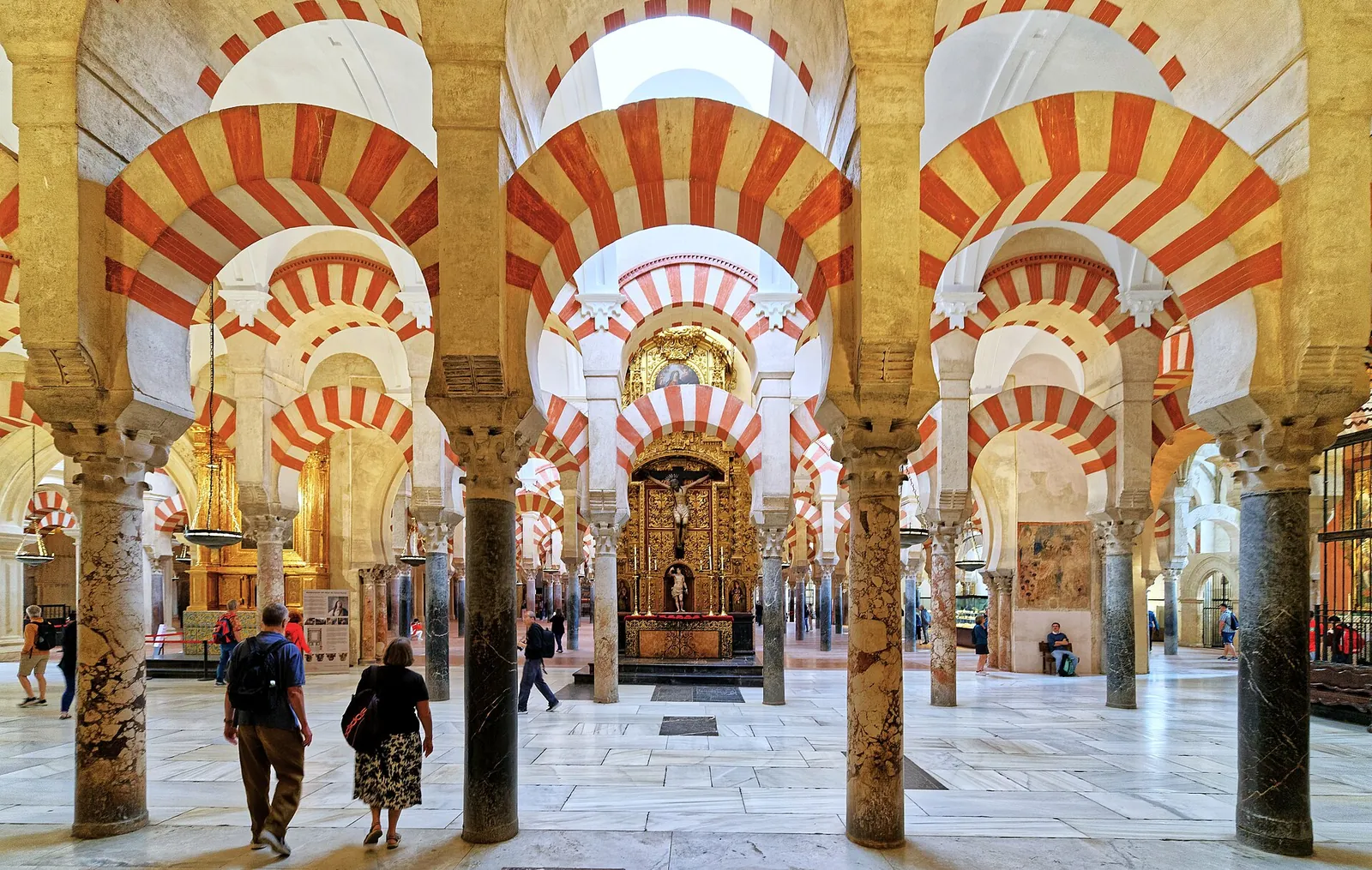 Red and white striped arches inside the Mezquita-Catedral