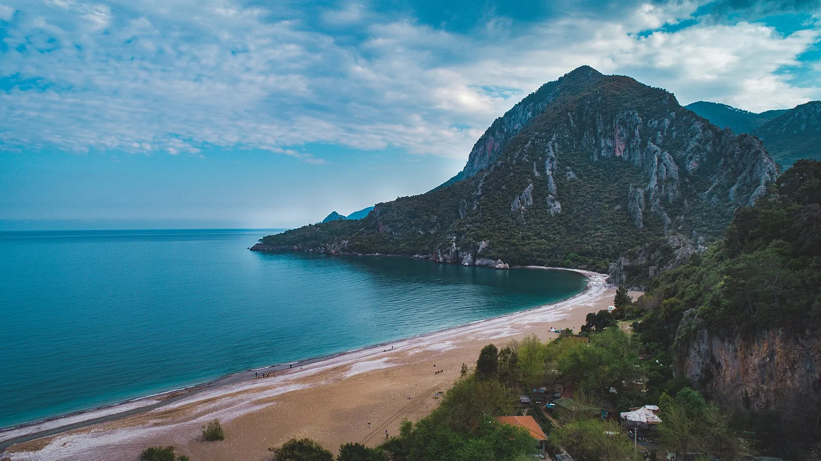 Olympos Beach and green mountains from above