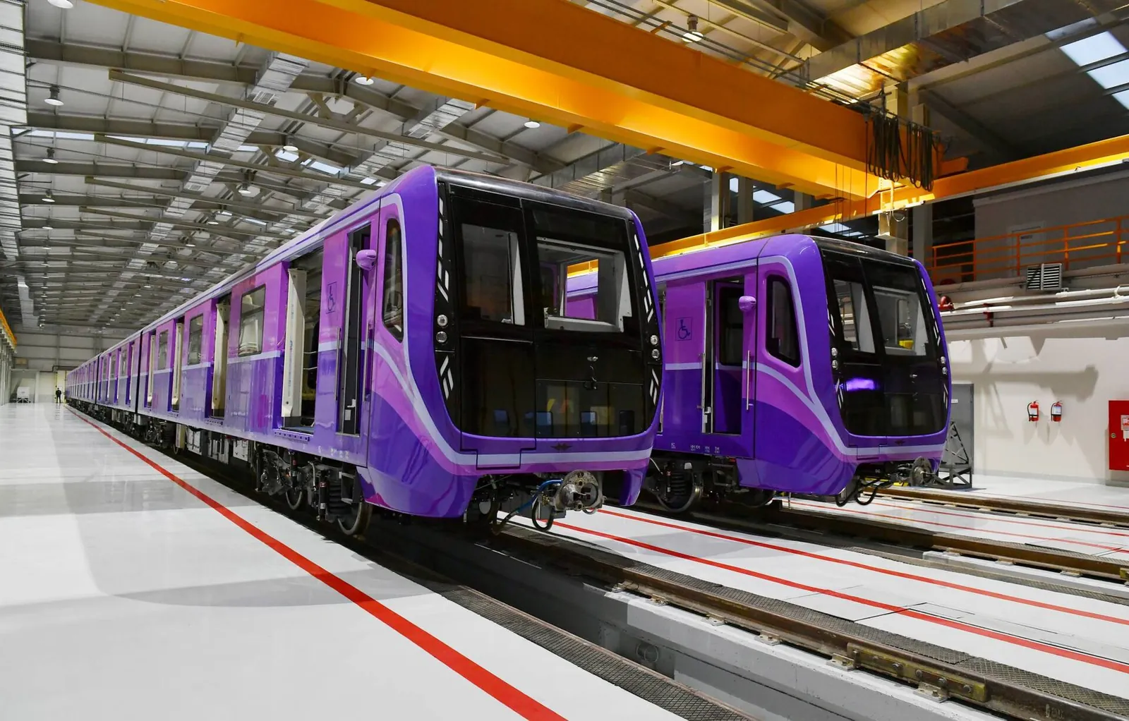 Bright purple Baku Metro trains in the Khojasan depot