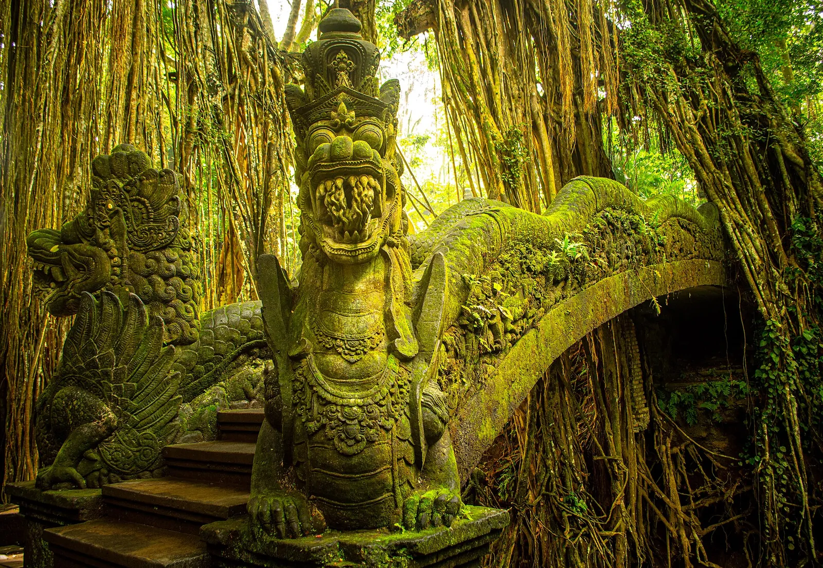 Mossy dragon bridge in Ubud's Sacred Monkey Forest