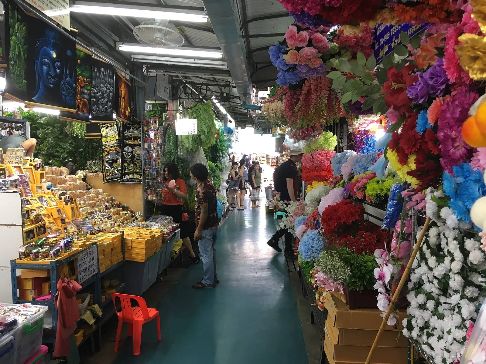 Colourful flower stalls inside Chatuchak Weekend Market