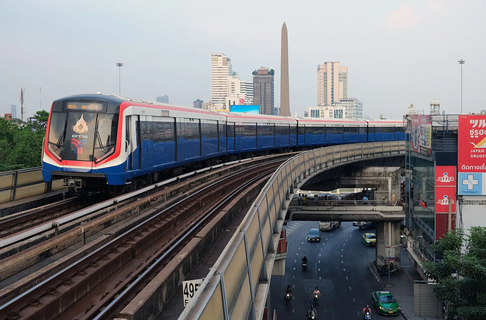 BTS Skytrain arriving at Victory Monument station