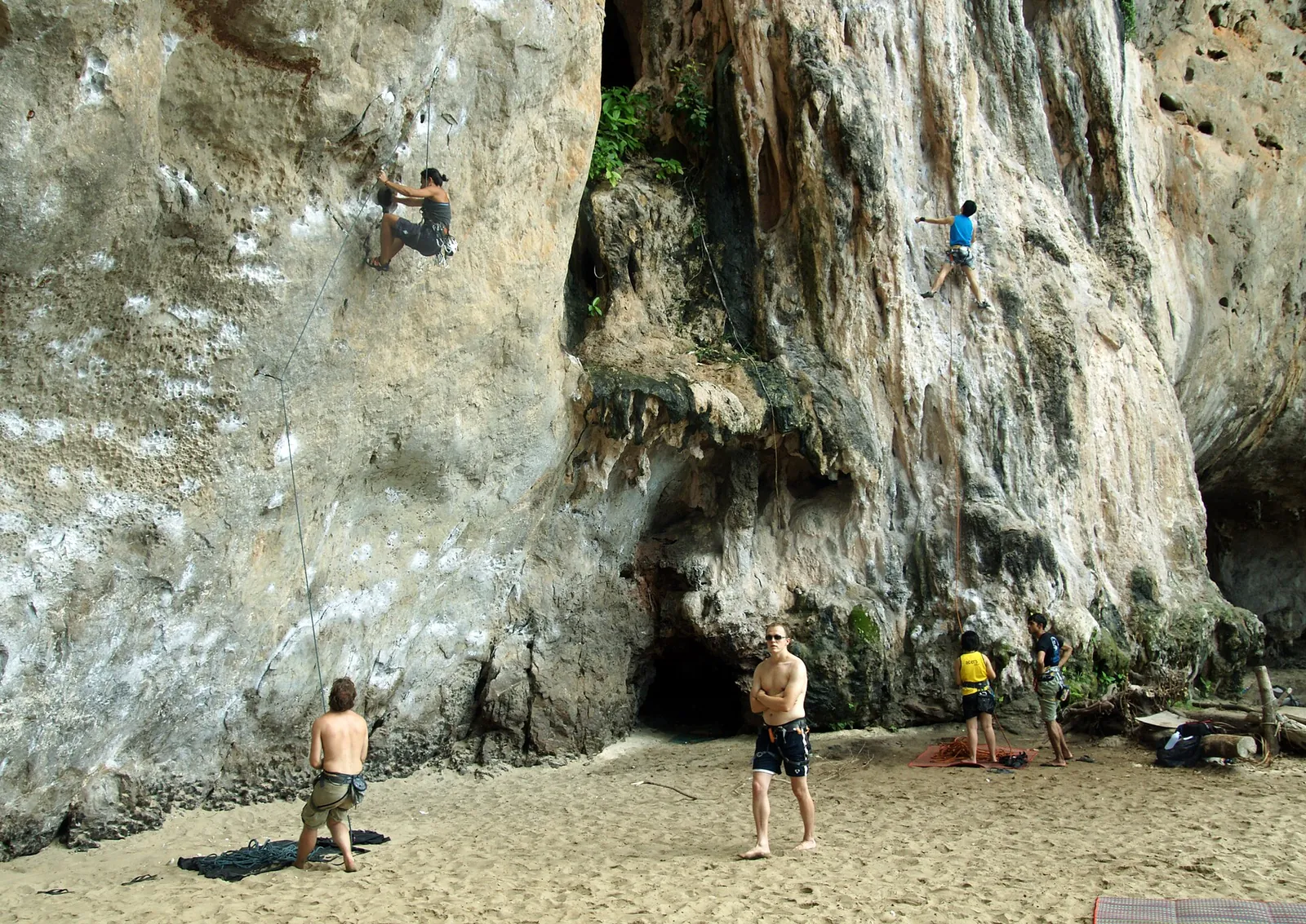Climbers on the limestone walls at Phra Nang