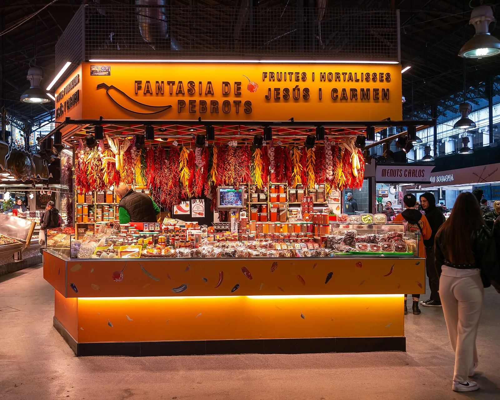 A colourful fruit and vegetable stall at La Boqueria