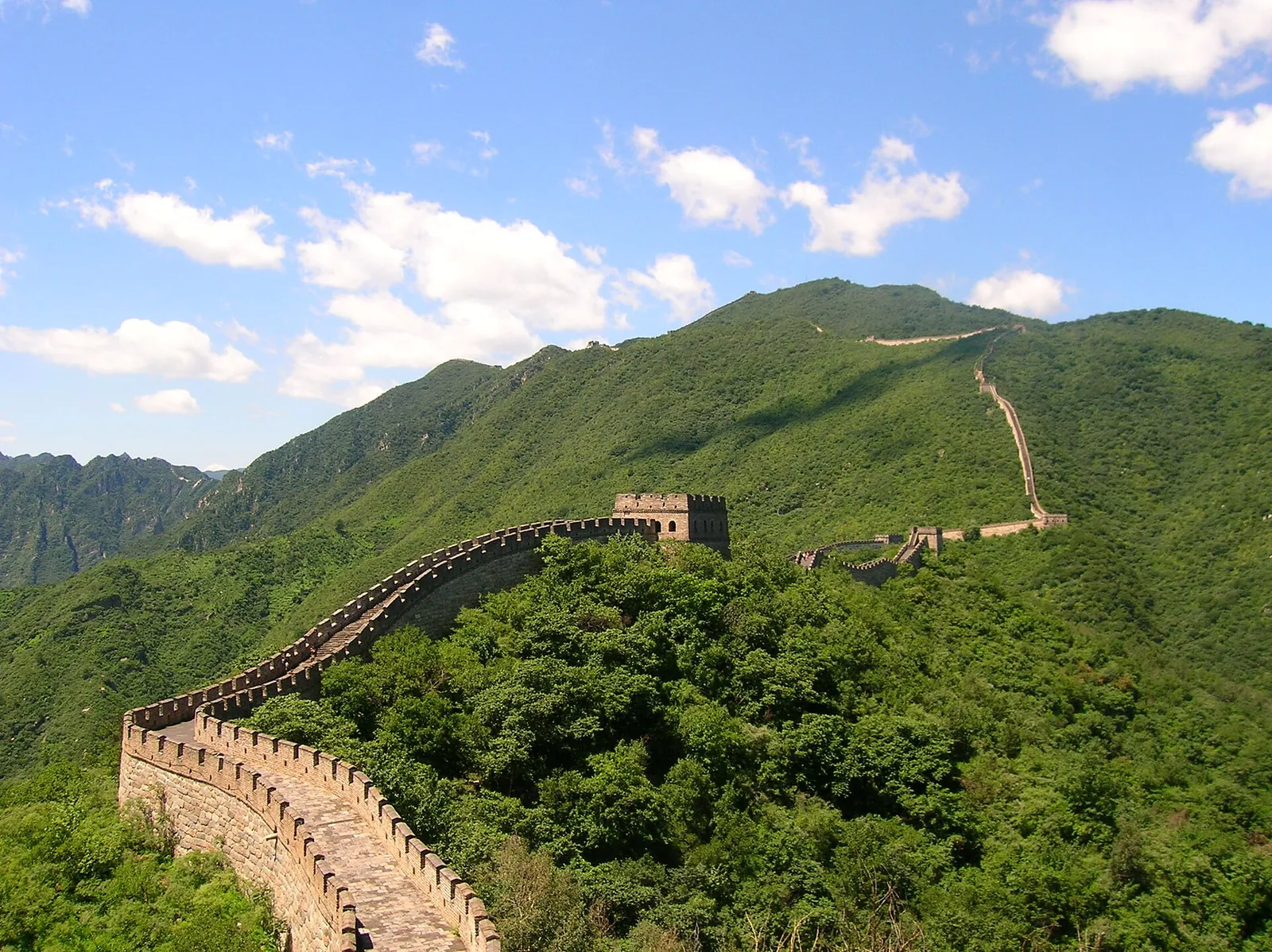 The Great Wall winding over green hills near Beijing