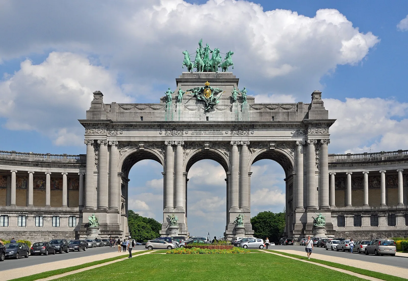 The triumphal arch of Parc du Cinquantenaire under blue sky