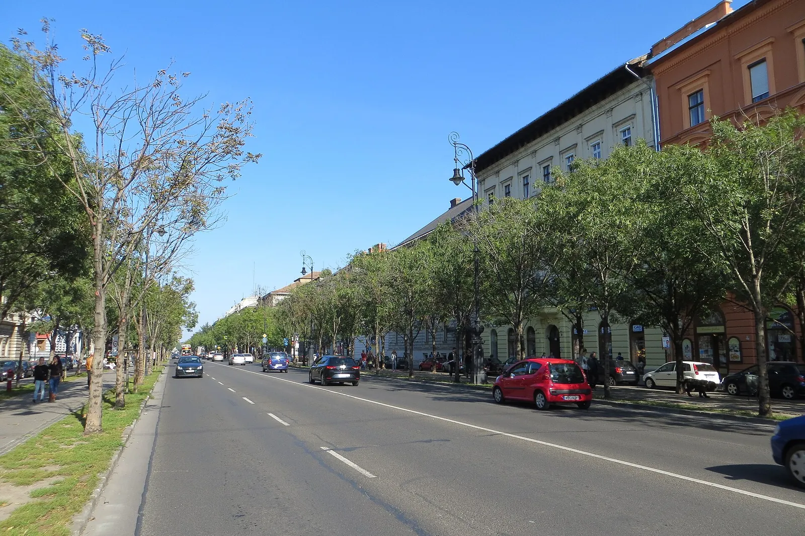 Tree-lined Andrássy út on a sunny day
