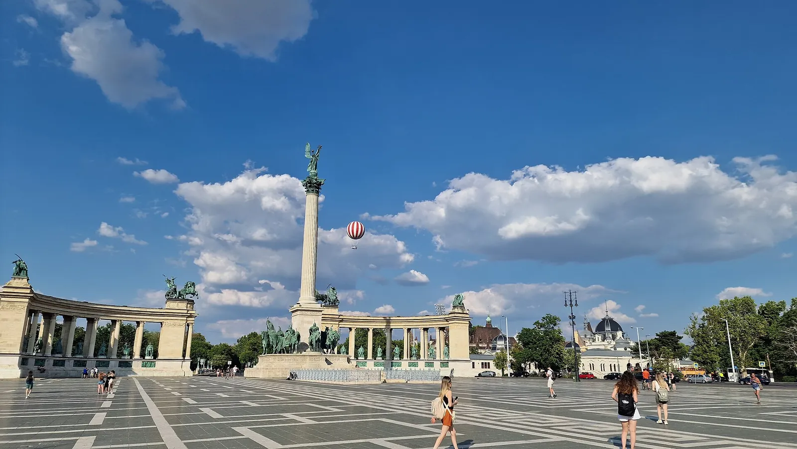 Heroes' Square and its colonnade under blue sky