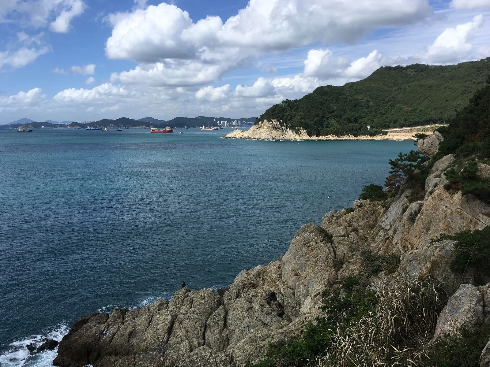 Rocky cliffs and turquoise sea at Taejongdae, Yeongdo