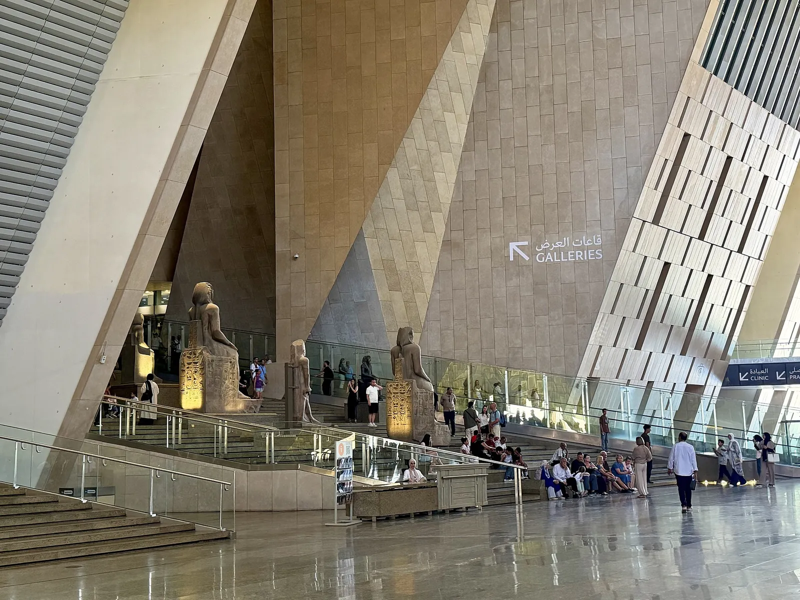 Statues lining the Grand Hall of the Grand Egyptian Museum