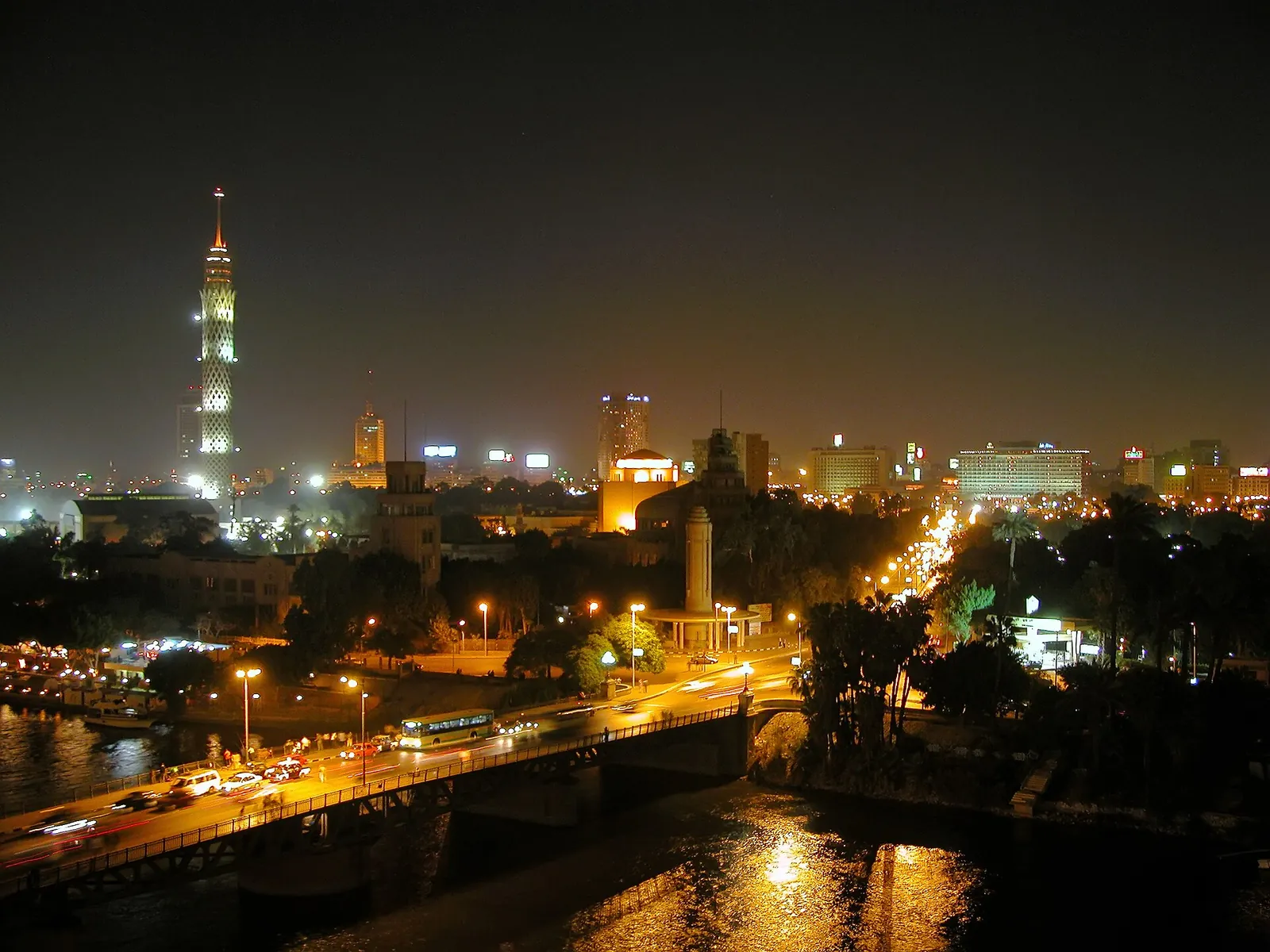 Cairo Tower and the Nile lit up at night