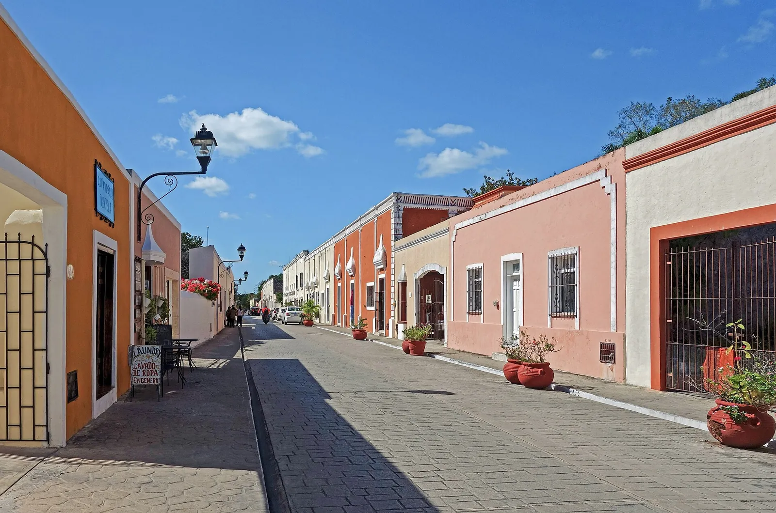 Pastel colonial houses lining a street in Valladolid