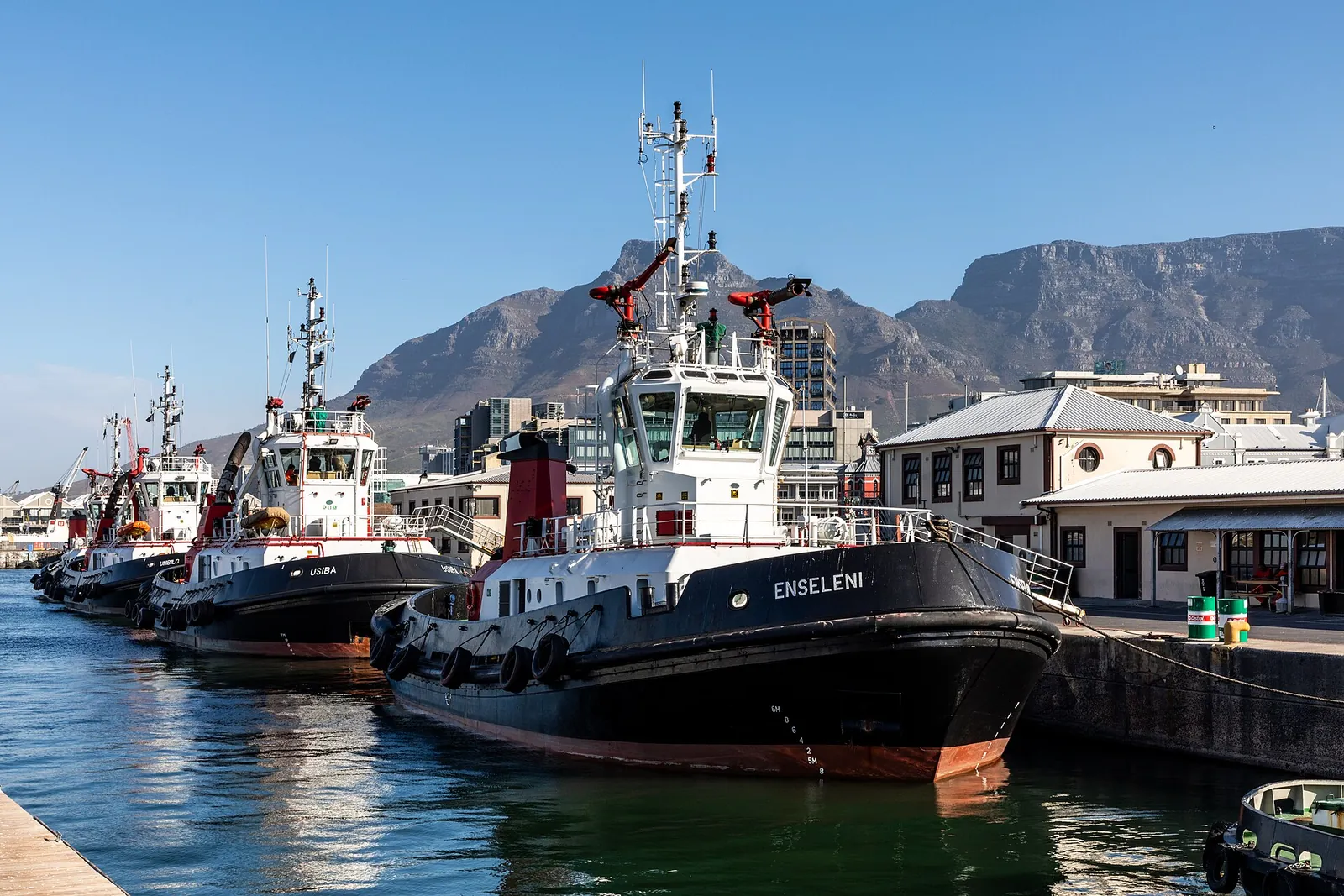 Tugboats in the V&A Waterfront harbour under Table Mountain