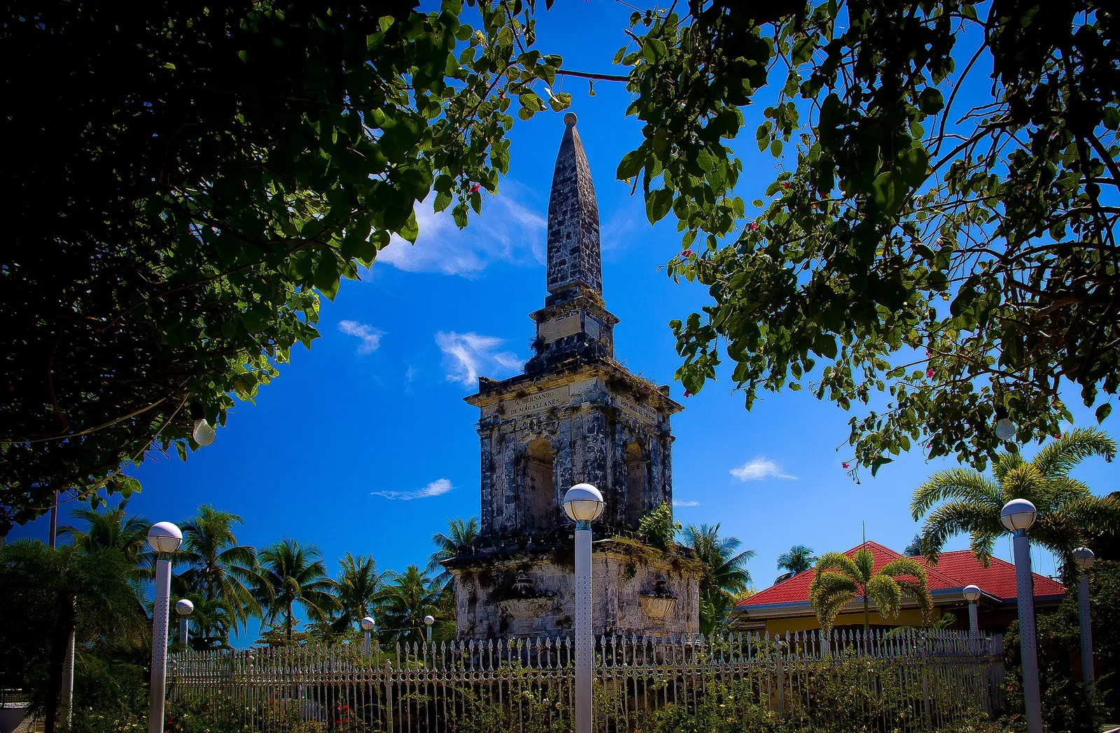 The Mactan Shrine framed by palms on Mactan Island