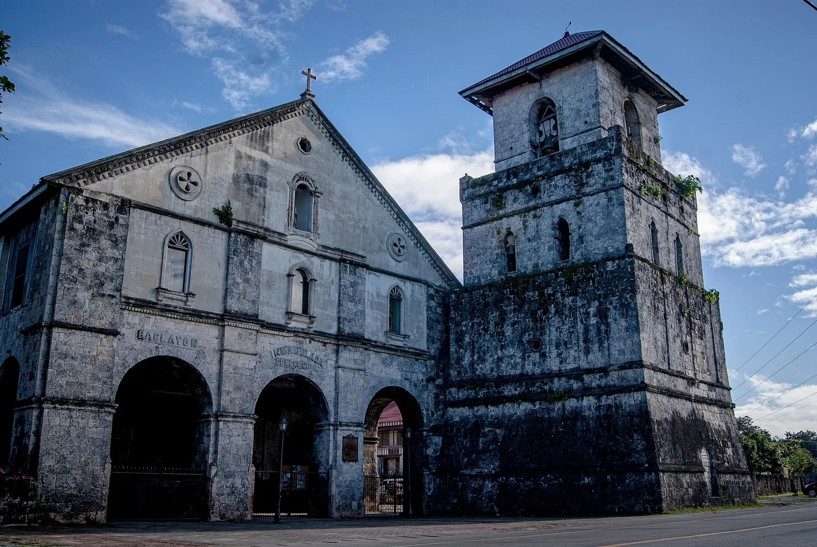 Coral-stone Baclayon Church under a bright sky