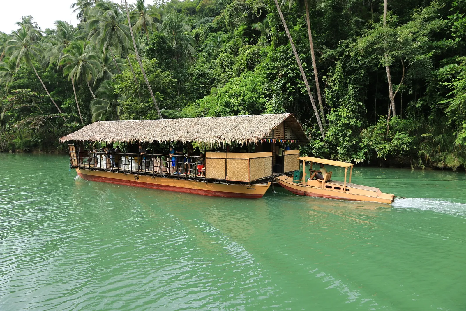 Floating restaurant cruising the green Loboc River