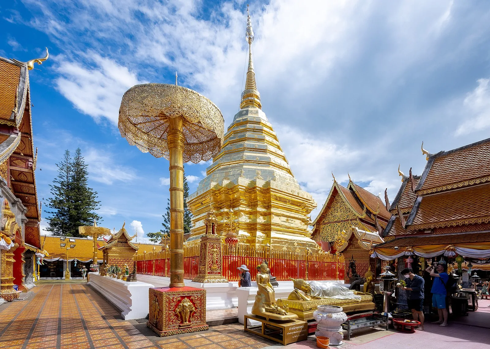 Golden umbrellas and chedi on the Doi Suthep terrace