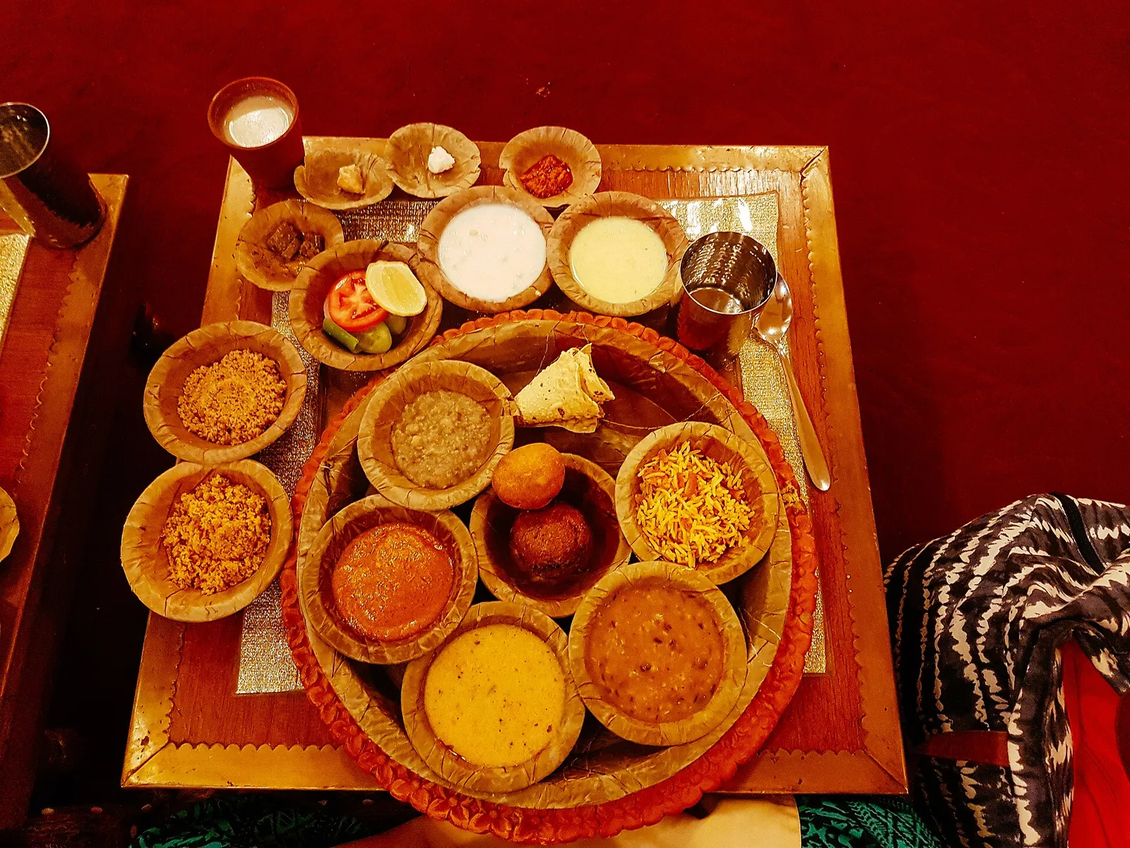 A colourful Rajasthani thali with many small dishes