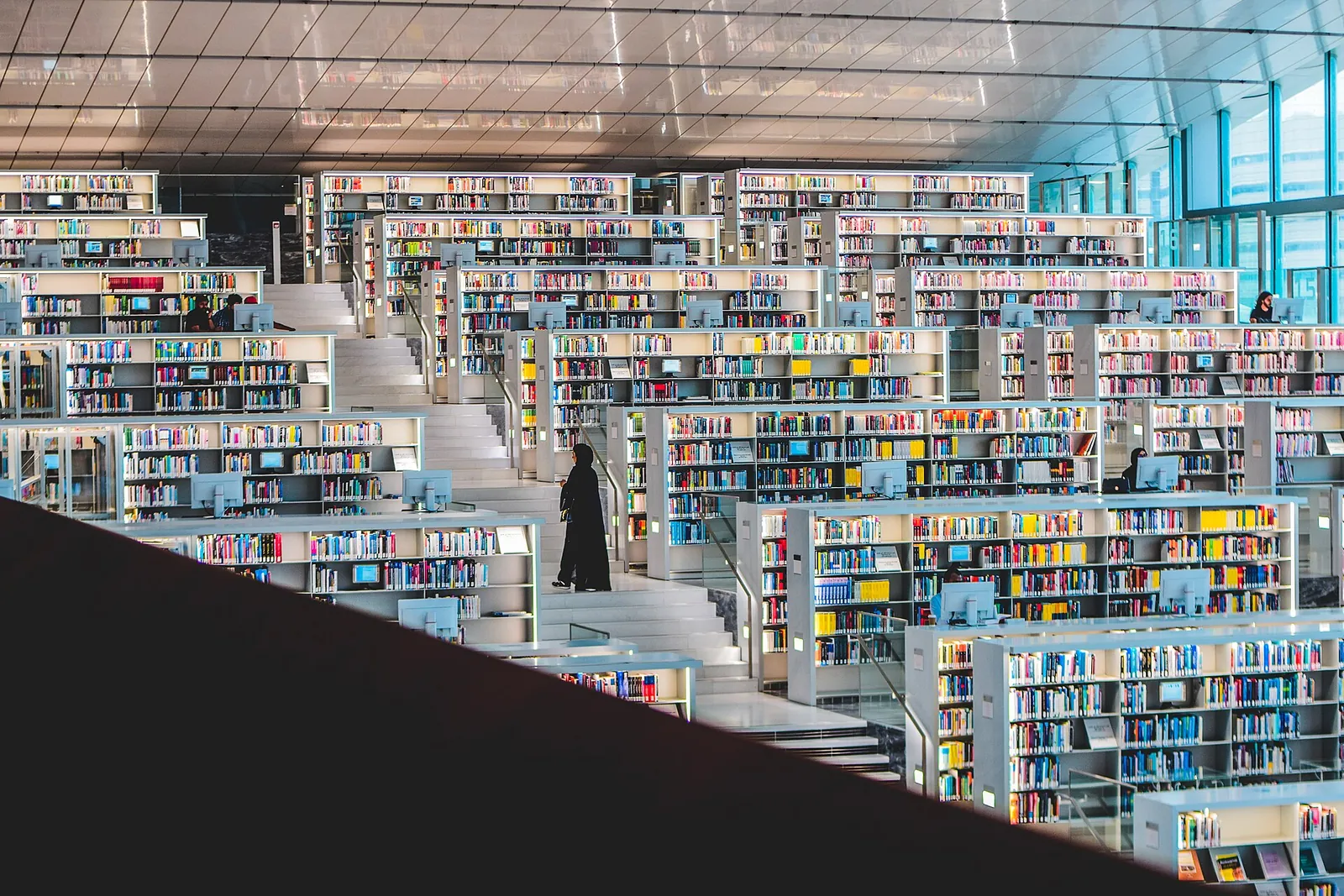 Bright shelves and terraces inside Qatar National Library