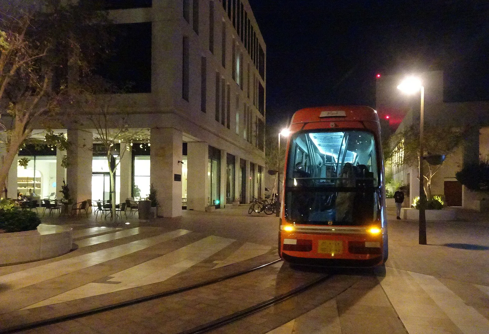 The Msheireb tram gliding through the district at night