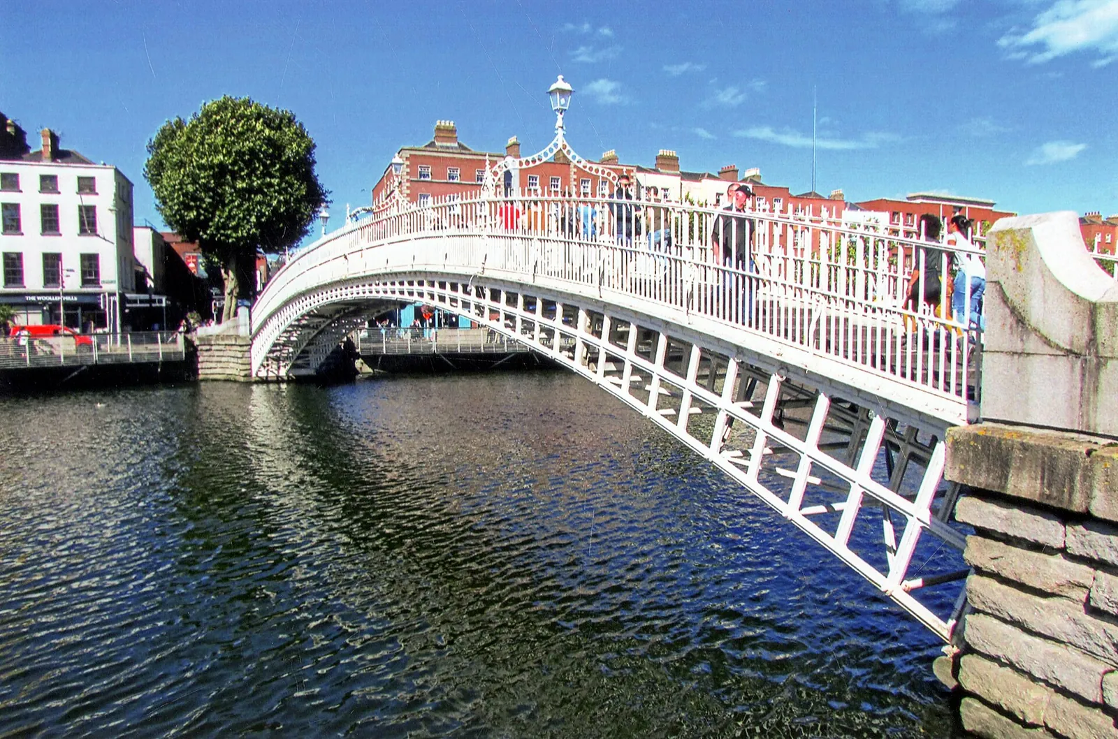 Ha'penny Bridge over the Liffey on a sunny day
