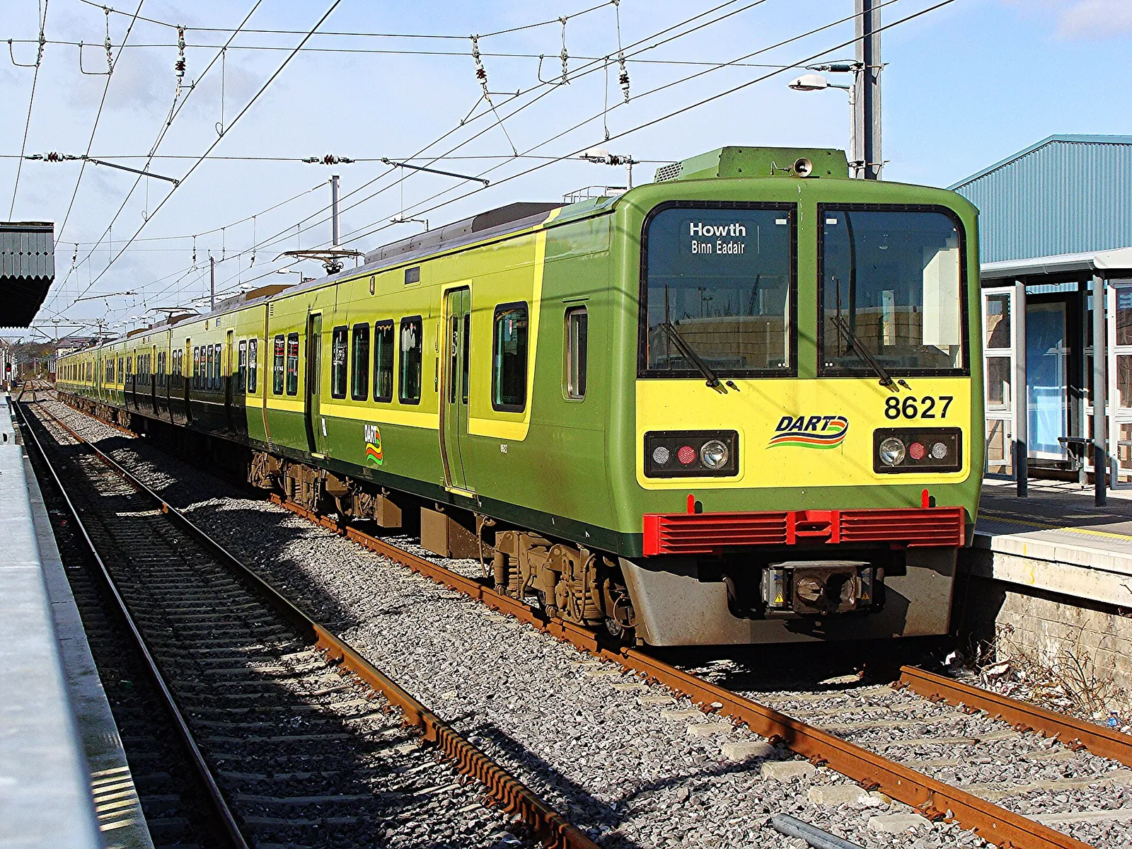 Green DART train waiting at Howth station