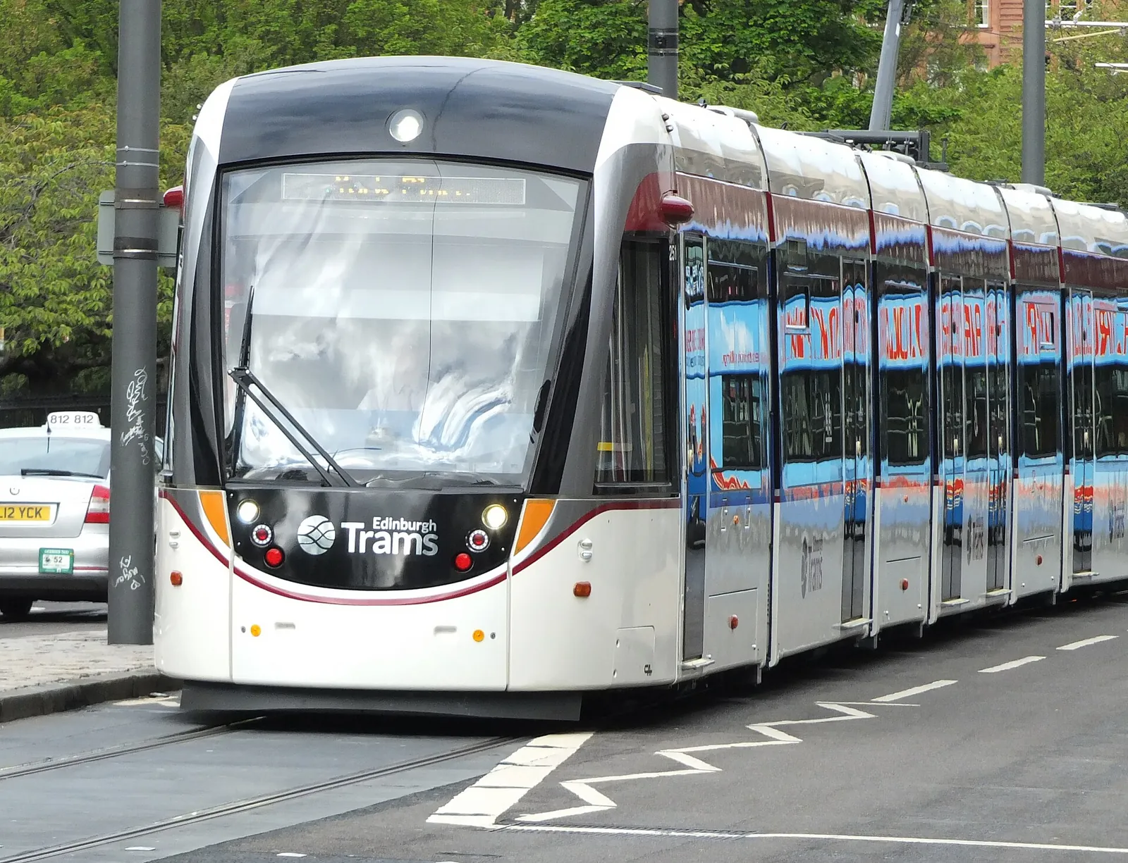 An Edinburgh tram on a sunny street
