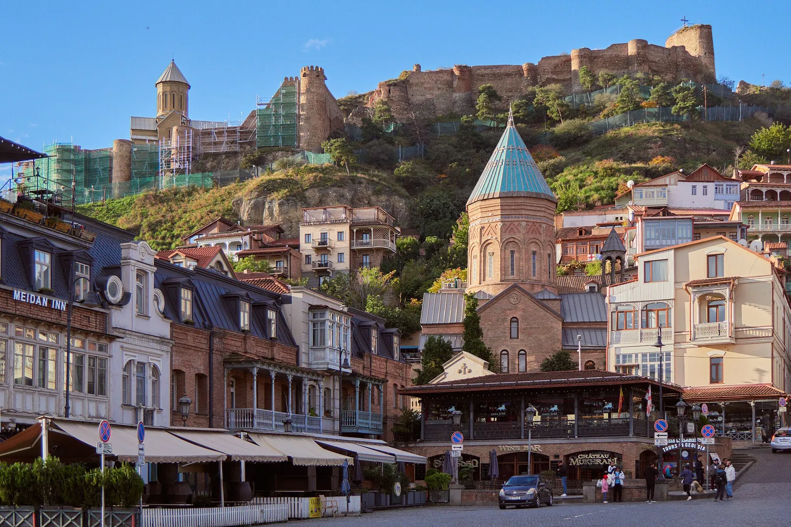 Old Tbilisi rooftops with Narikala Fortress above