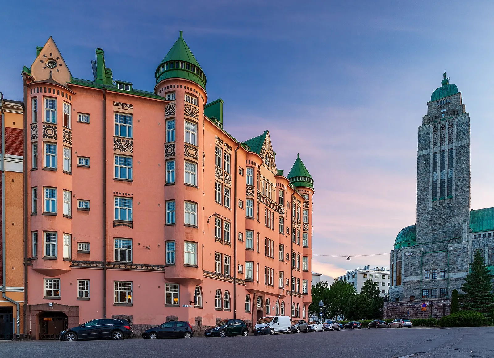 Pastel apartment blocks and Kallio Church tower