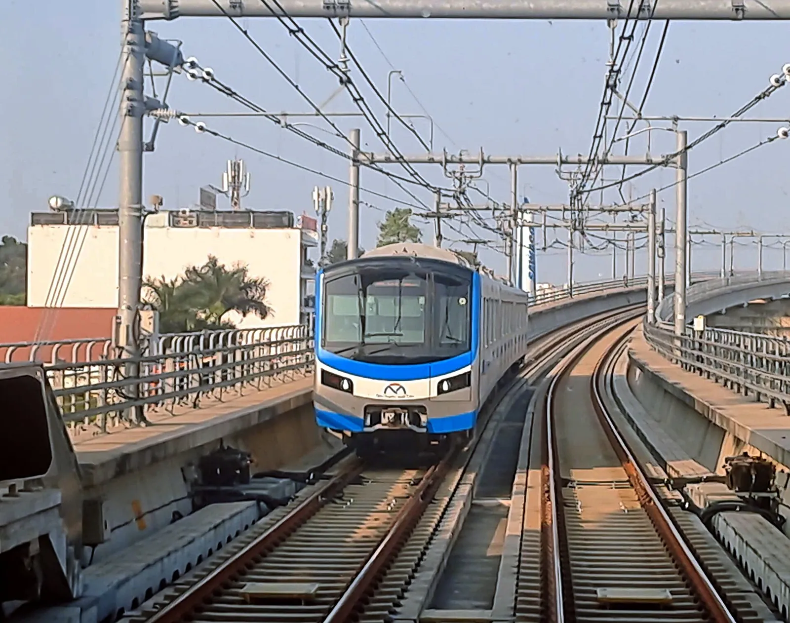 A Metro Line 1 train on the elevated tracks