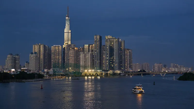 Ho Chi Minh City skyline over the Saigon River at blue hour