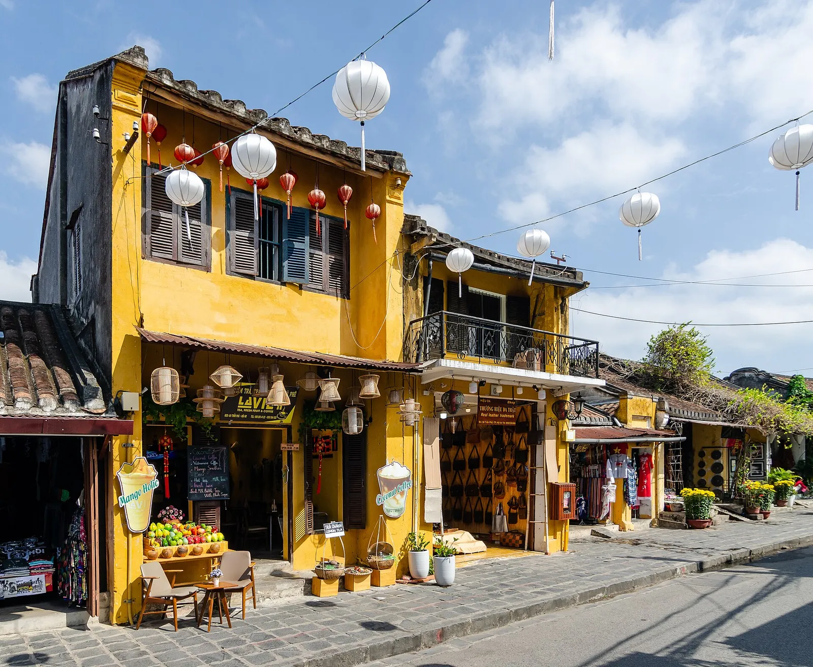 Yellow shophouses and paper lanterns in the Ancient Town