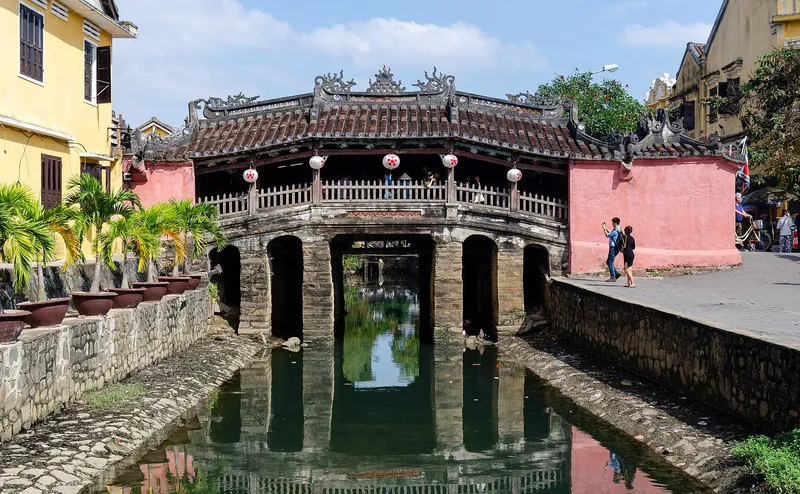 The Japanese Covered Bridge reflected in the canal, Hoi An