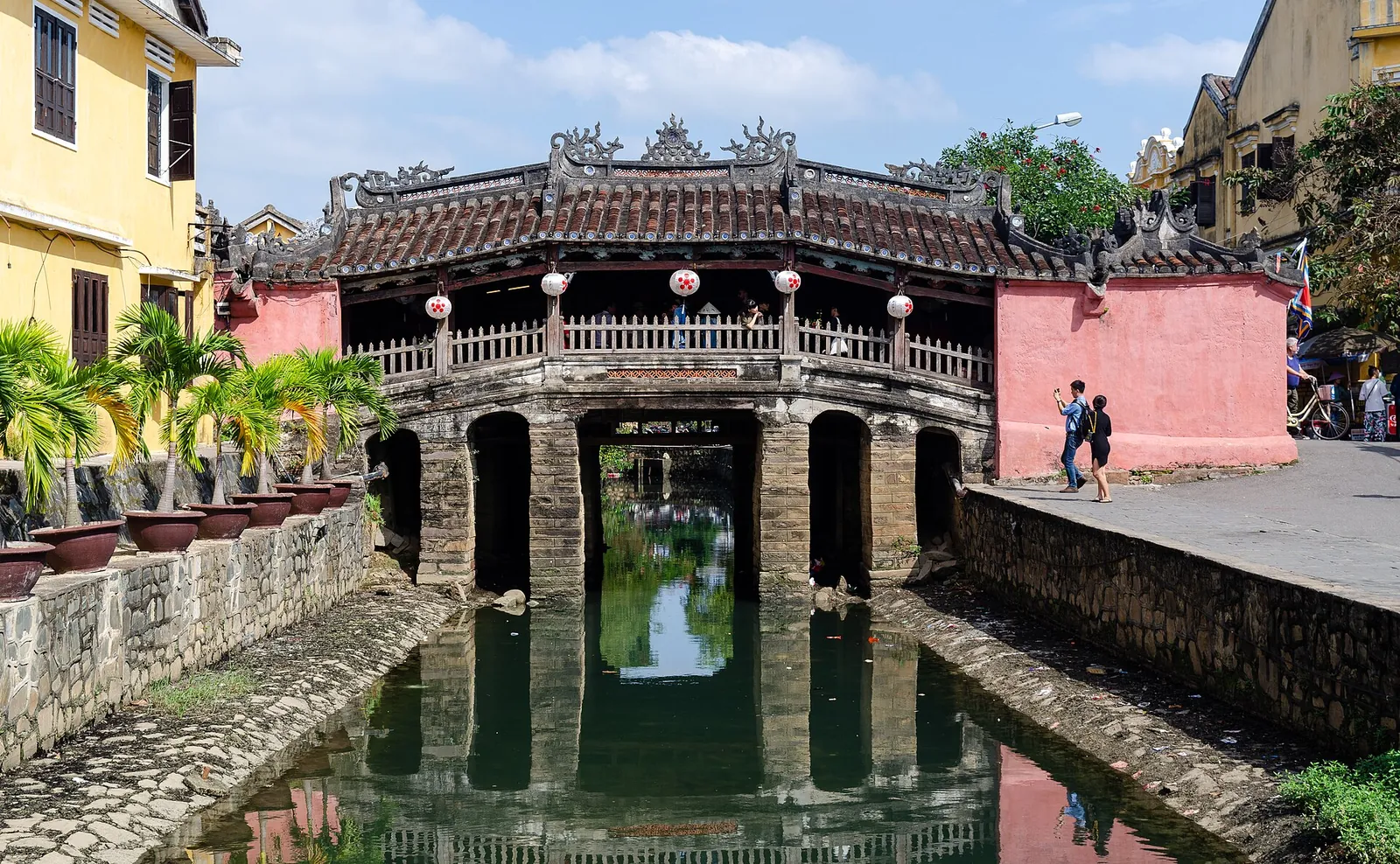 The Japanese Covered Bridge reflected in the canal, Hoi An