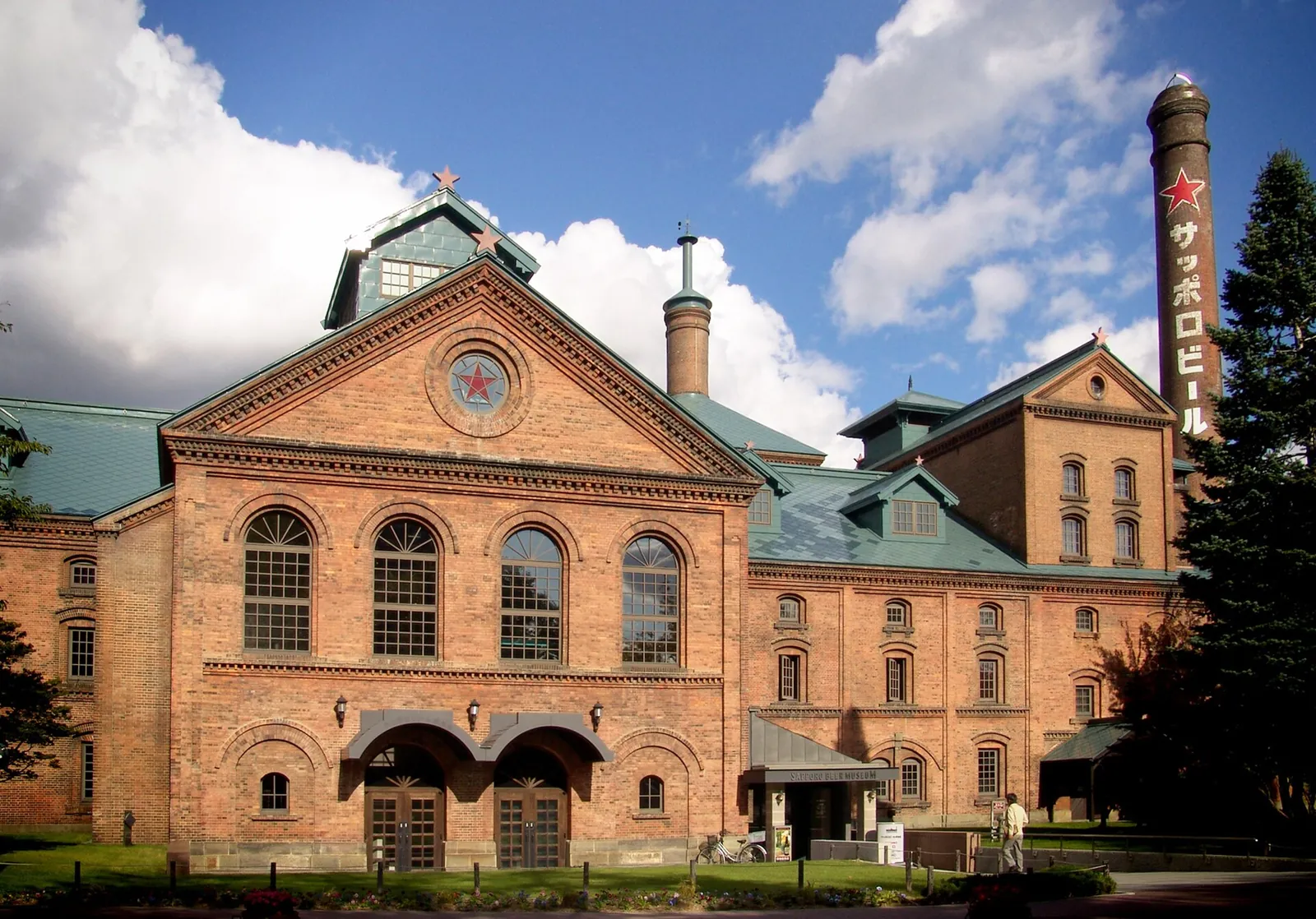 Red-brick Sapporo Beer Museum under a blue sky
