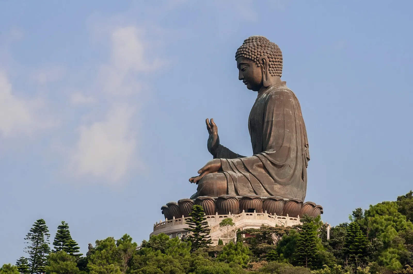 The Tian Tan Big Buddha against a blue sky