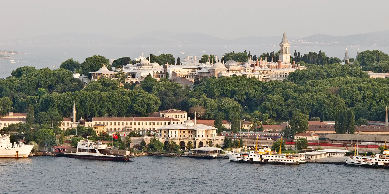 Topkapı Palace among the trees above the waterfront