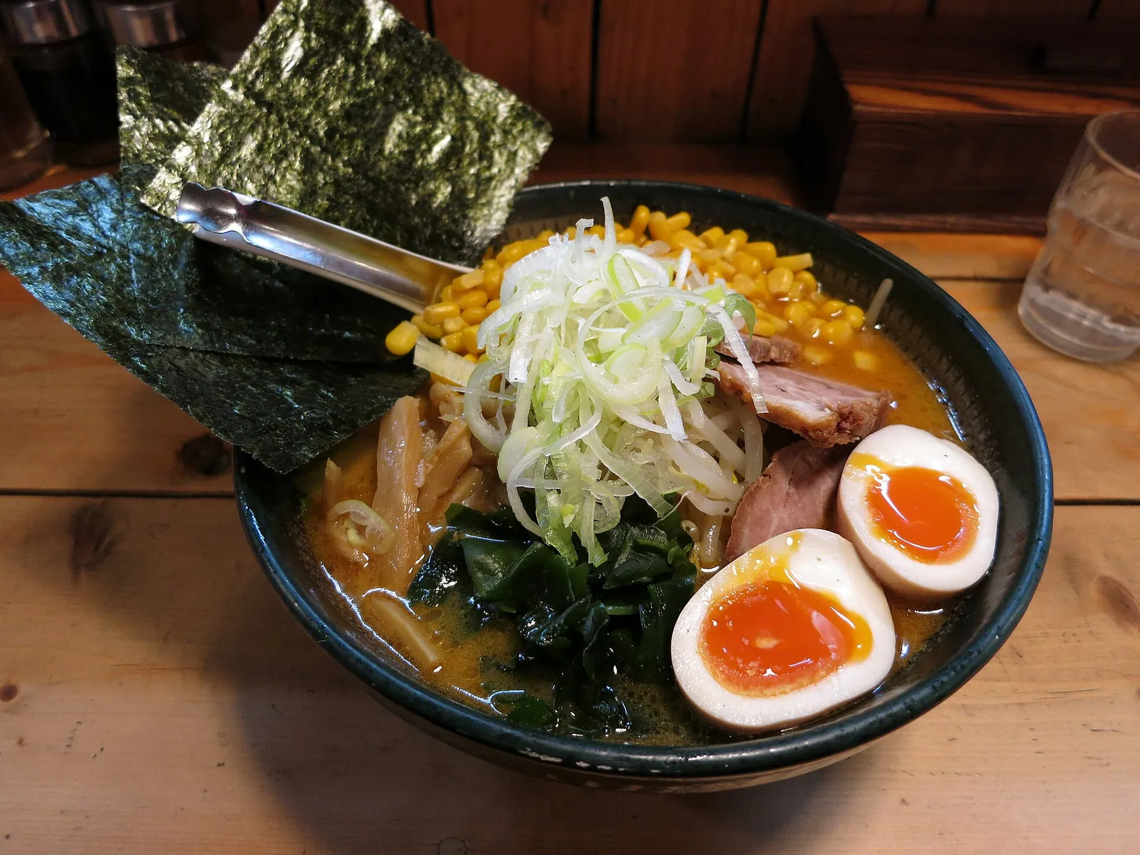 Steaming bowl of ramen with soft-boiled eggs