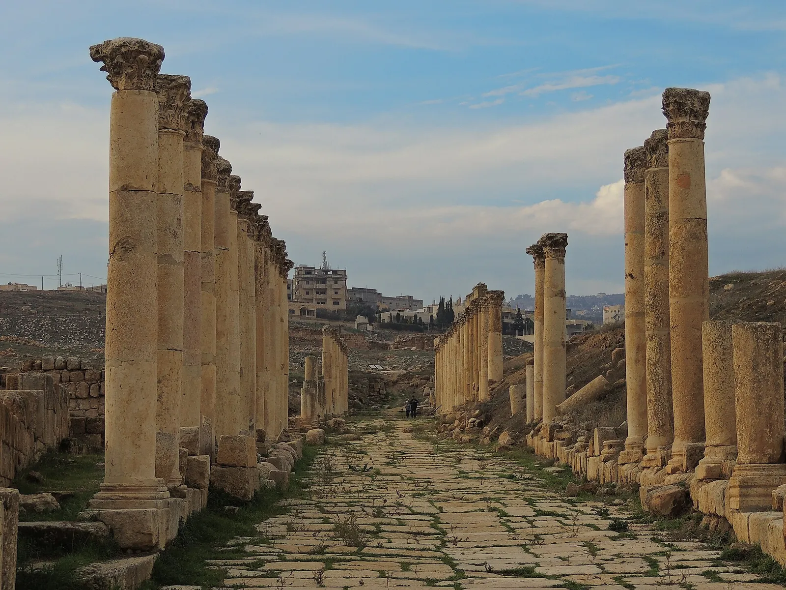 Tall columns lining Jerash's ancient colonnaded street