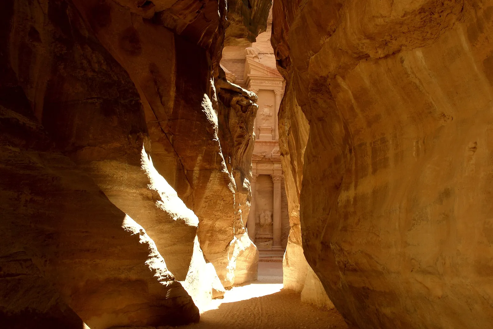 First glimpse of the Treasury through the narrow Siq