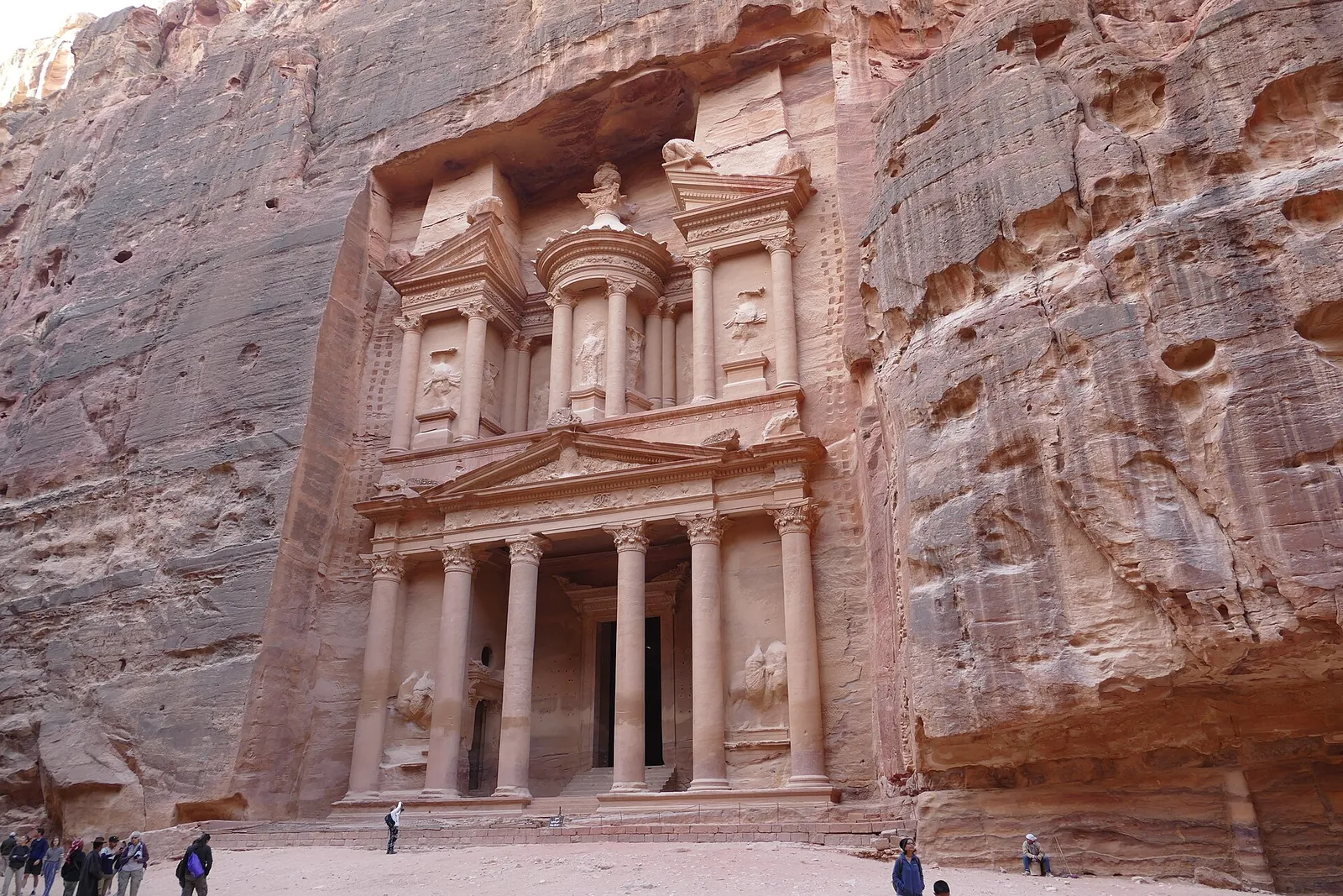 Visitors dwarfed by the Treasury's carved facade