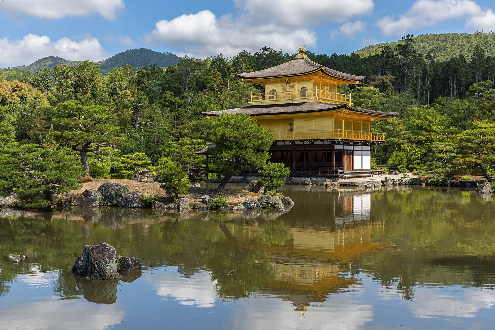 Kinkaku-ji's golden pavilion reflected in its pond