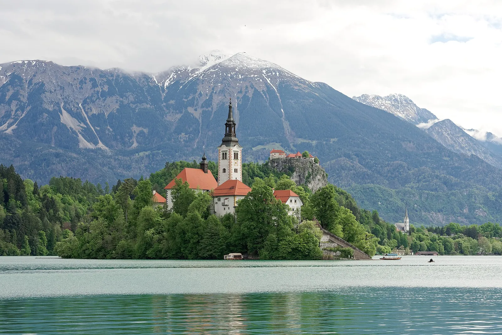 Bled Island and its church below the Julian Alps