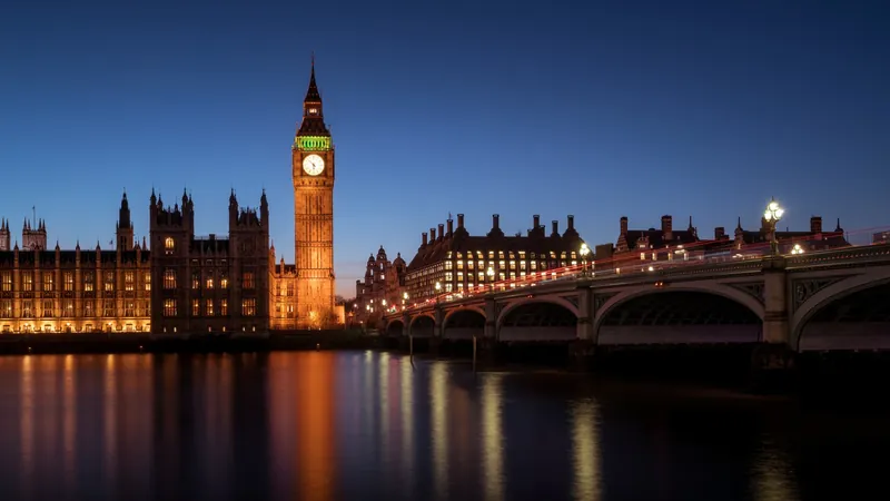 Houses of Parliament and Big Ben glowing over the Thames