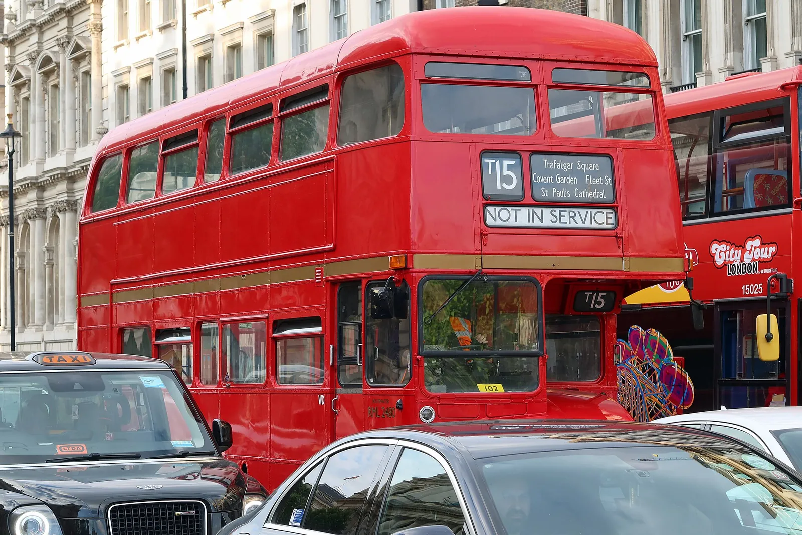 A classic red double-decker bus in central London