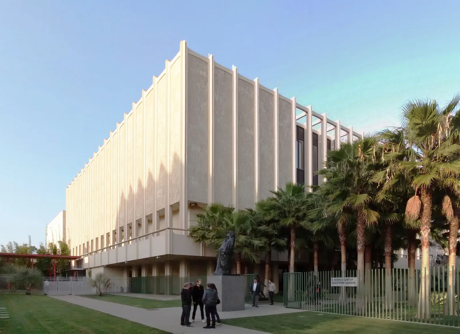 LACMA's galleries framed by palm trees on Wilshire